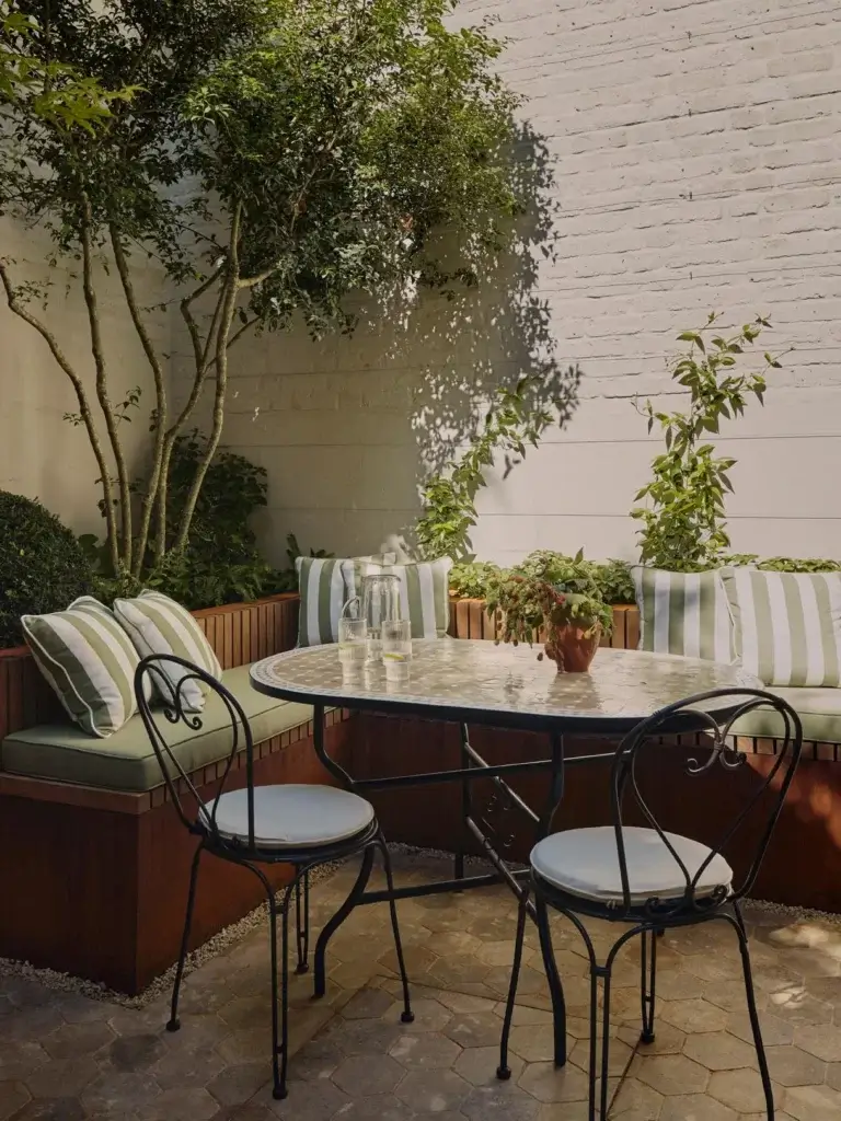 indoor-outdoor space with patio and dining setup