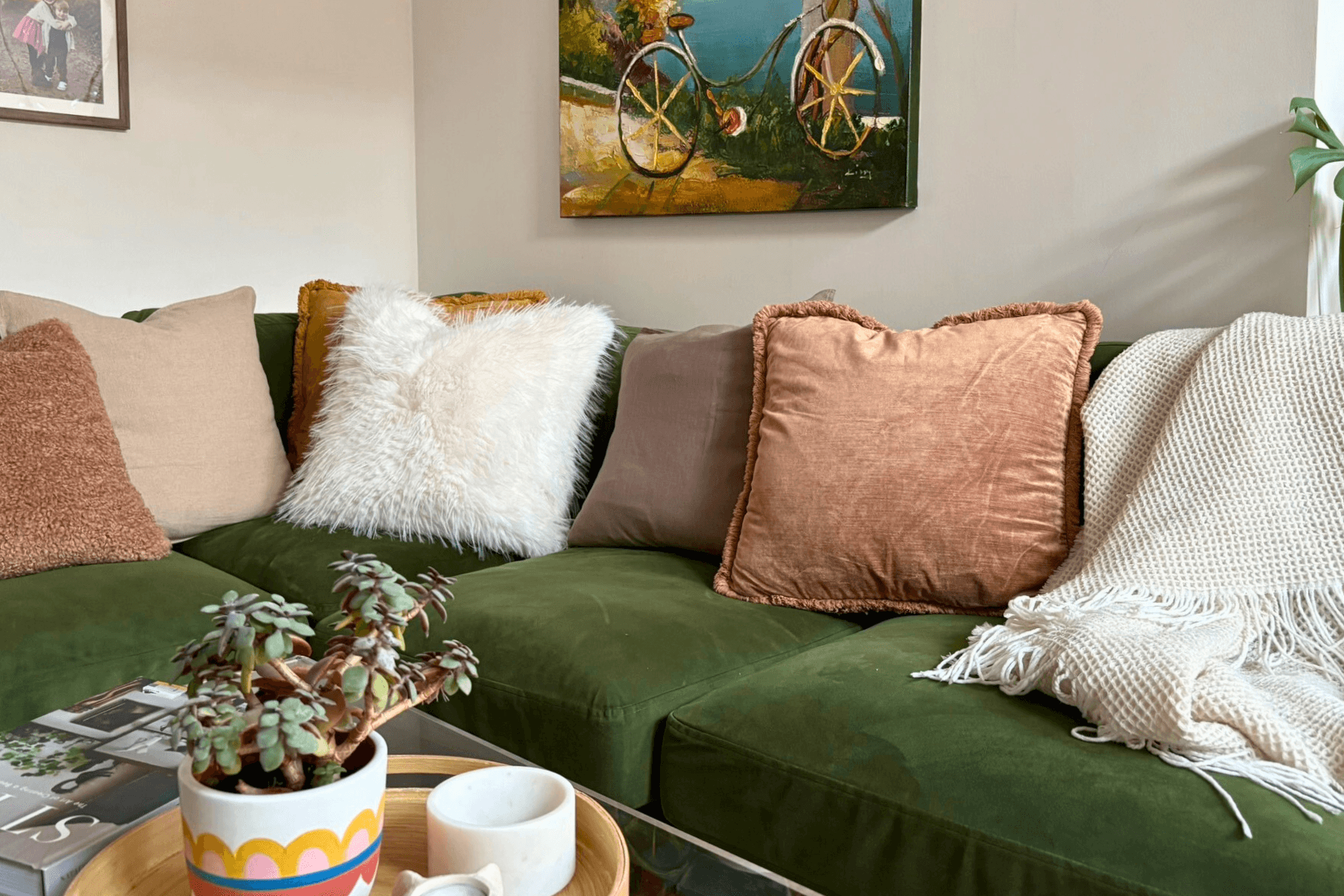 The Sofa + Layout Guide - green sofa and fluffy cushions